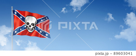 Confederate death flag isolated on a blue sky. Horizontal banner 89603041