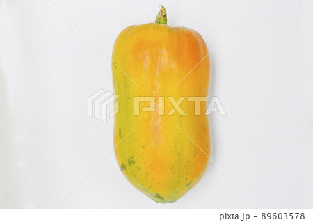 Ripe papaya on white background taken in top view Ripe papaya on white background taken in top view 89603578
