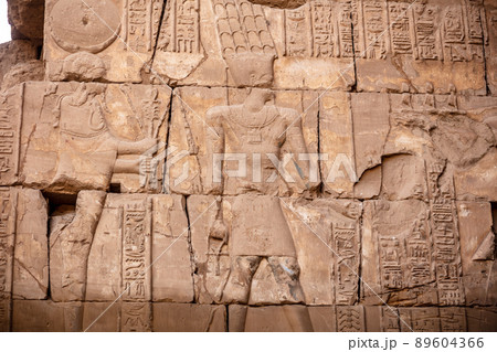 Different hieroglyphs on the walls and columns in the Karnak temple. Karnak temple is the largest complex in ancient Egypt. Different hieroglyphs on the walls and columns in the Karnak temple. Karnak temple is the largest complex in ancient Egypt. 89604366