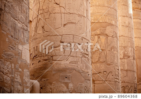 Different columns with hieroglyphs in Karnak temple. Karnak temple is the largest complex in ancient Egypt. 89604368