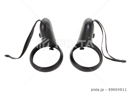 Top view of the joysticks from the virtual reality glasses isolated on a white background. Left and right controllers of the VR helmet. Top view of the joysticks from the virtual reality glasses isolated on a white background. Left and right controllers of the VR helmet. 89604811
