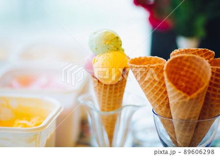 Empty waffle cone in glass for ice cream. Empty waffle cone in glass for ice cream. 89606298