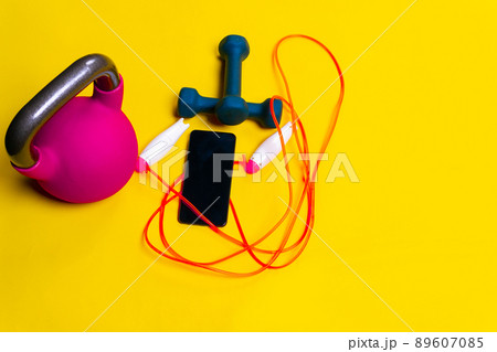 Space kettlebell rope yellow blue jump isolated background cast fit, from black dumbbell from heavy and lifestyle sport, color pound. Simplicity hand man, strong 89607085