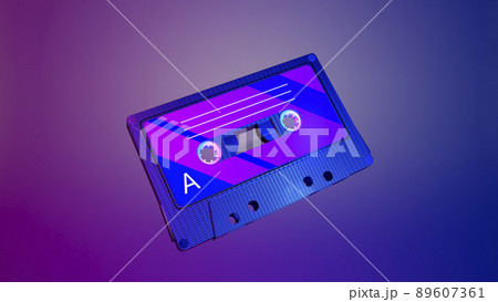 3d audio cassette with tape. Vintage audio cassette with retro music from the 80s and 90s on a neon colored background. Music, entertainment concept. 89607361