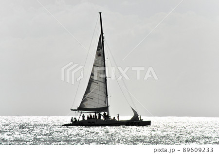 Beautiful yacht in the open sea on a sunny day Beautiful yacht in the open sea on a sunny day 89609233