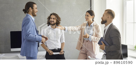 Banner view of smiling multiracial businesspeople cooperate in office 89610590