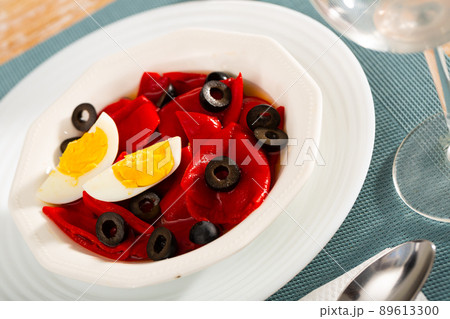 Salad of baked sweet peppers with boiled egg and olives 89613300