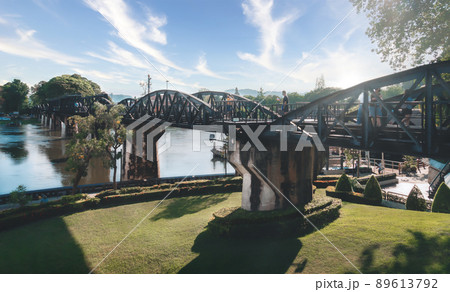 People are crossing the historical bridge of World War 2 in River Kwai. People are crossing the historical bridge of World War 2 in River Kwai. 89613792