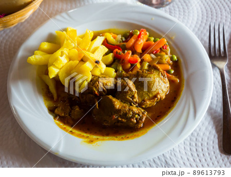 Appetizing baked pork cheeks 89613793