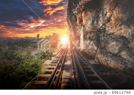Susnet Light at the end of The Death Railway Of World War 2 in River Kwai Kanachanaburi,Thailand. for hope and success concept. 89613798