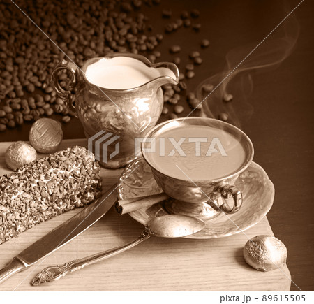 Sweets on the background of coffee on the table Sweets on the background of coffee on the table 89615505