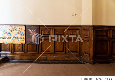 Antique old retro wooden decorative panel with vintage golden frames in Lviv, Ukraine 89617433