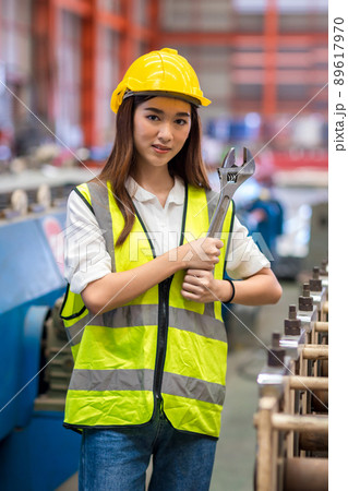 Foreman or worker work at factory site check up machine or products in site. 89617970