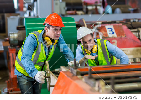 Foreman or worker work at factory site check up machine or products in site. 89617975