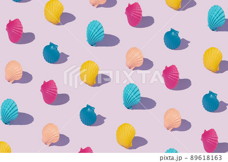 Pattern with multicolored shells on a purple background. 89618163