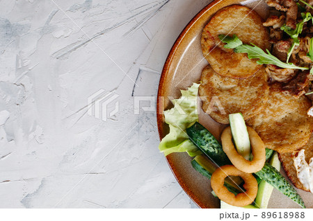 Cropped topview of tasty potato puncakes breakfast 89618988