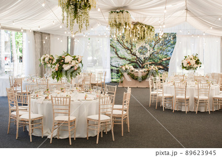 Wedding table decoration with flowers and ribbons 89623945
