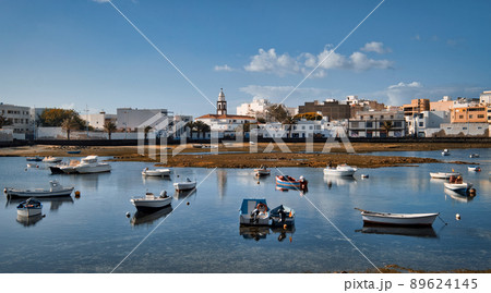 Fishing boats docked in bay. Arrecife town 89624145