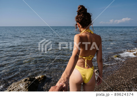 Follow me on the beach by the sea in summer on vacation 89624374