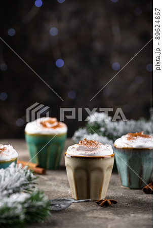 Christmas Tom and Jerry cocktail with whipped cream 89624867