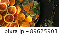 Cutrus orange fresh fruits on black, flat lay 89625903