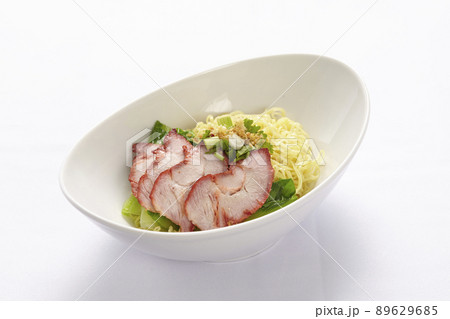 egg noodles with BBQ pork  and vegetable isolated on white background, Asian food style. 89629685