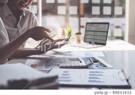 Group of IT consultant working by digital tablet and management big data and analyze financial document of company. Group of IT consultant working by digital tablet and management big data and analyze financial document of company. 89631633