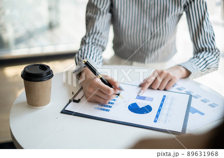 Group of Business people and Accountant checking data document on digital tablet for investigation of corruption account . Anti Bribery concept. Group of Business people and Accountant checking data document on digital tablet for investigation of corruption account . Anti Bribery concept. 89631968