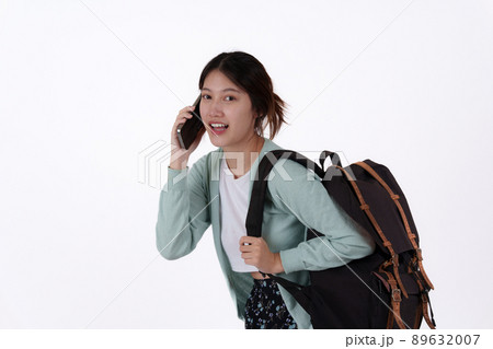 Young college student with backpack isolated over white background. E-learning ,online ,education concept. Young college student with backpack isolated over white background. E-learning ,online ,education concept. 89632007