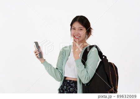 Young college student with backpack isolated over white background. E-learning ,online ,education concept. 89632009