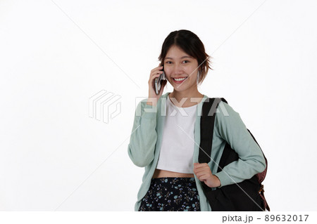 Young college student with backpack isolated over white background. E-learning ,online ,education concept. 89632017