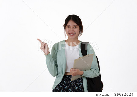 Young college student with backpack isolated over white background. E-learning ,online ,education concept. Young college student with backpack isolated over white background. E-learning ,online ,education concept. 89632024
