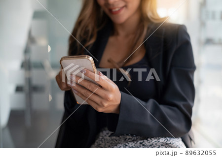 A businesswoman completes KYC using an online banking program in order to open a digital savings account. The definition of cyber security. 89632055