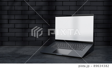 Laptop Mock-Up Empty screen front black brick wall. shadow of tree and window. Decorate minimalist style. 89634382