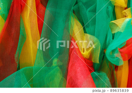 Multicolor Fabric texture tied to tree 89635839
