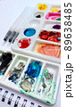 Flat lay sketchbook, watercolor brushes and color palette 89638485