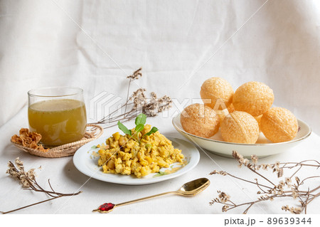 Homemade pani puri, Golgappa Indian snack on cotton calico background 89639344