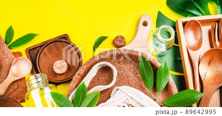 Ecological tableware made of natural materials.Life without Plastic.Eco friendly disposable tableware.Recycling concept.Set of empty reusable,disposable eco-friendly plates, on yellow background. Ecological tableware made of natural materials.Life without Plastic.Eco friendly disposable tableware.Recycling concept.Set of empty reusable,disposable eco-friendly plates, on yellow background. 89642995
