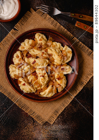 Dumplings, filled with mashed potatoes. 89644302
