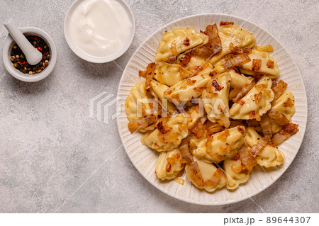 Dumplings, filled with mashed potatoes. 89644307