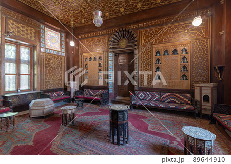 Manial Palace of Prince Mohammed Ali. Guests Hall with wooden ornate ceiling and wooden ornate door, Cairo, Egypt 89644910