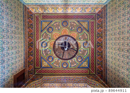 Royal era colorful wooden ceiling with floral pattern decorations at historic Manial palace of Prince Mohammed Ali, Cairo, Egypt 89644911