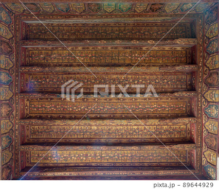 Ottoman era decorated wooden ceiling with golden floral pattern decorations at historic House of Egyptian Architecture 89644929