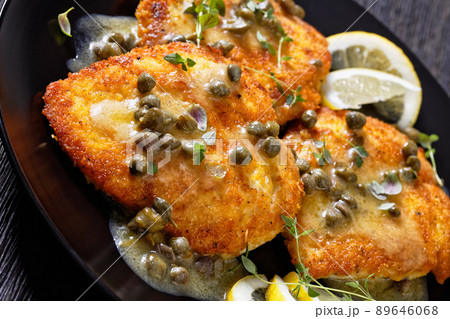 chicken piccata with lemon capers butter sauce chicken piccata with lemon capers butter sauce 89646068