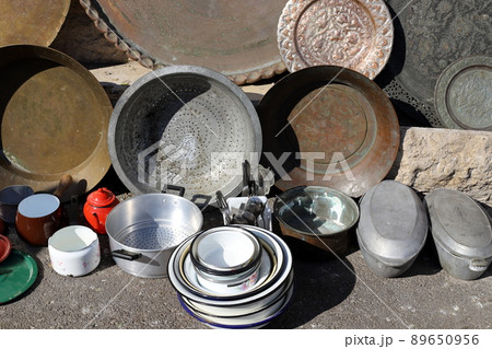 Very old and rusty things are sold at a flea market in Tel Aviv 89650956