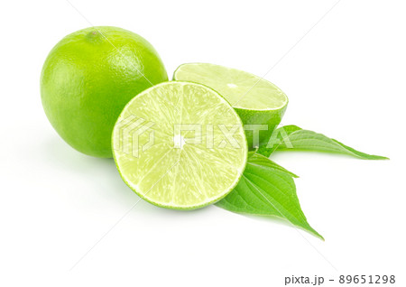 Fresh lime with two half isolated on white Fresh lime with two half isolated on white 89651298
