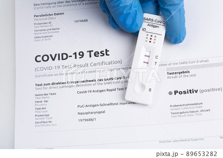 Positive test result by using rapid test device for COVID-19. 89653282