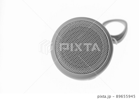 Audio speaker close-up on a white background, Speaker system. Musical column, top view. Audio speaker close-up on a white background, Speaker system. Musical column, top view. 89655945