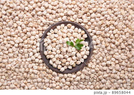 Chickpeas and wooden plate. Top view. Chickpeas and wooden plate. Top view. 89658044