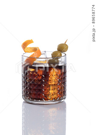 Vermouth cocktail with ice isolated on white background with copy space. Vertical format. 89658774